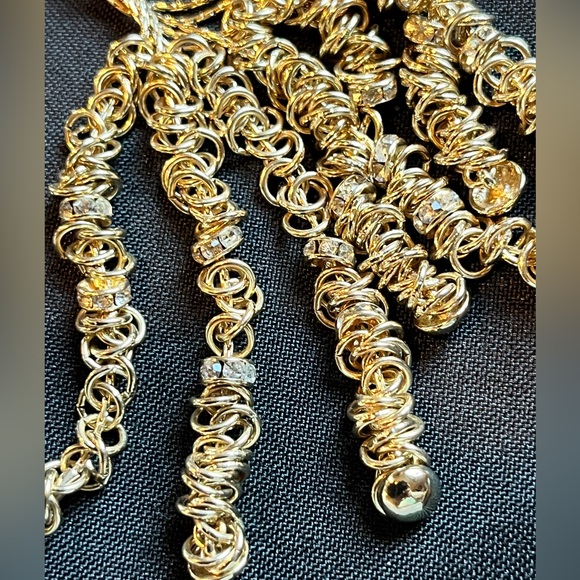 Classic and contemporary at the same time. Gold multi/tassel statement necklace - Picture 10 of 12